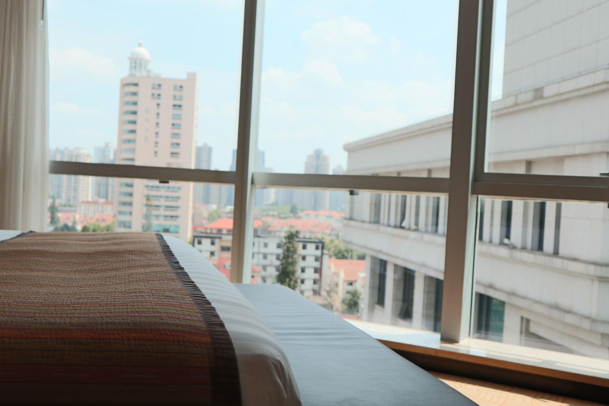 Howard Johnson Huaihai Hotel Shanghái Exterior foto