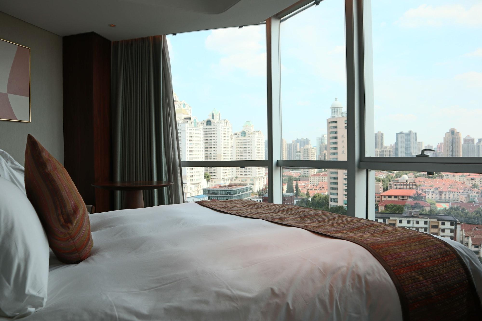 Howard Johnson Huaihai Hotel Shanghái Exterior foto
